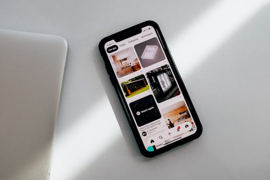 NOVU MagPad foldable wireless charger stand on a desk
